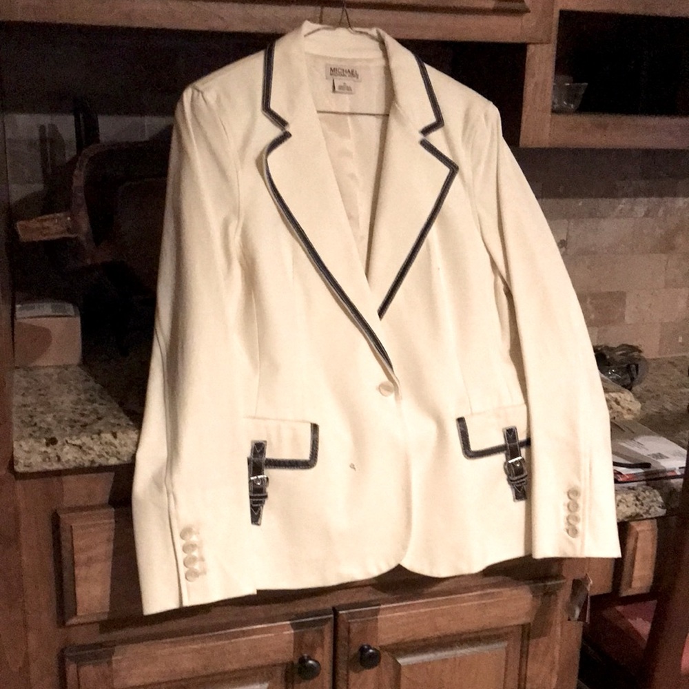 Cotton Lycra with faux leather trim .size 10 never been worn.